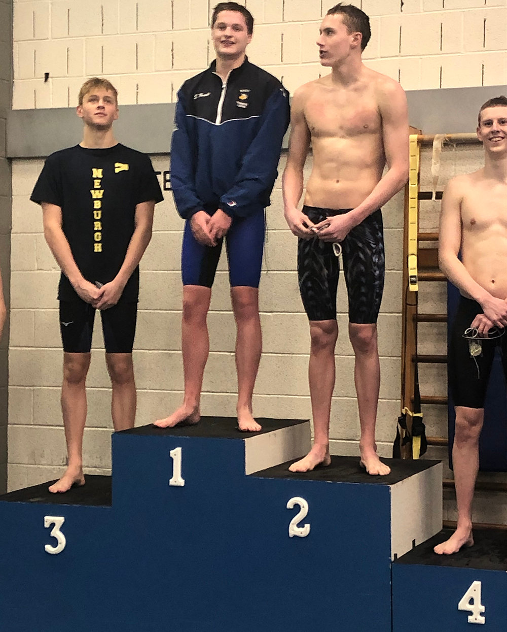 Valley Central’s Sean Zupko stands on the podium after winning the 500-yard freestyle at the Section 9 championship meet at Valley Central High School.